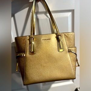 Brand New! MICHAEL Kors “Voyager” Gold-Leather Tote. Gifted and never used.